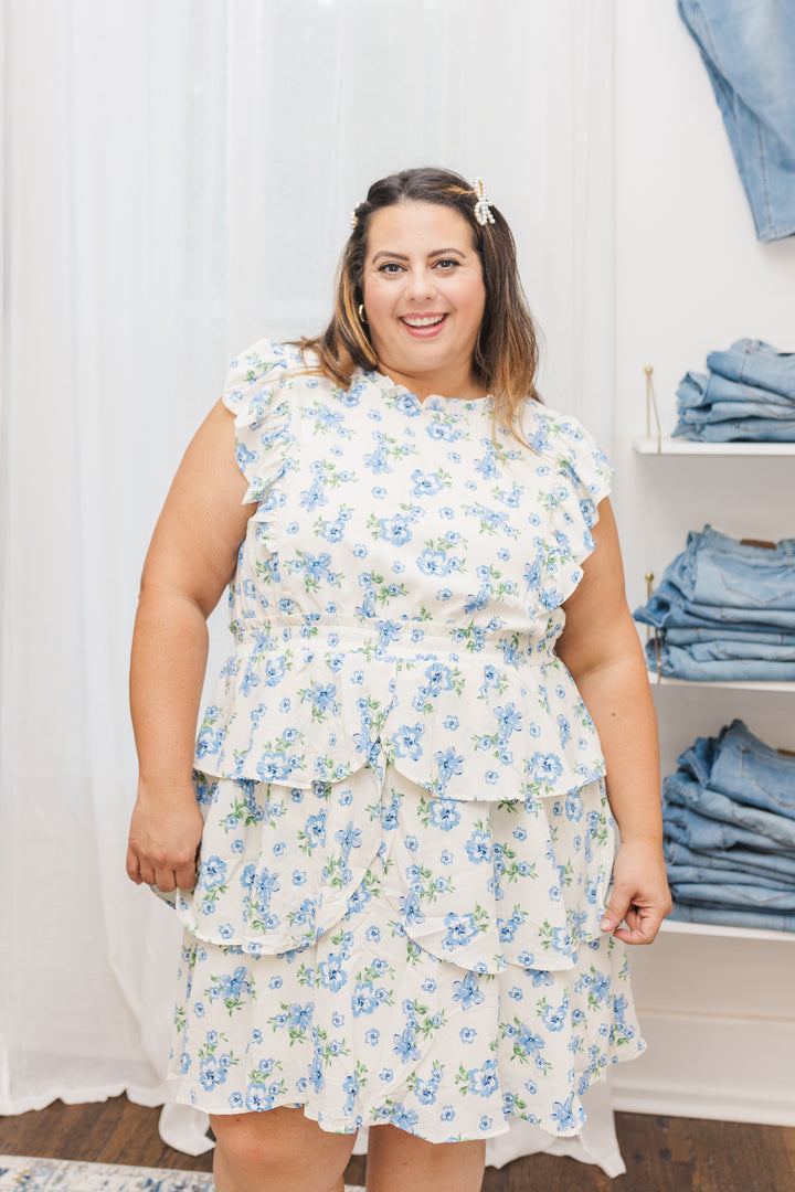 Chrissy Ruffled Sleeveless Dress In Cream and Blue Floral