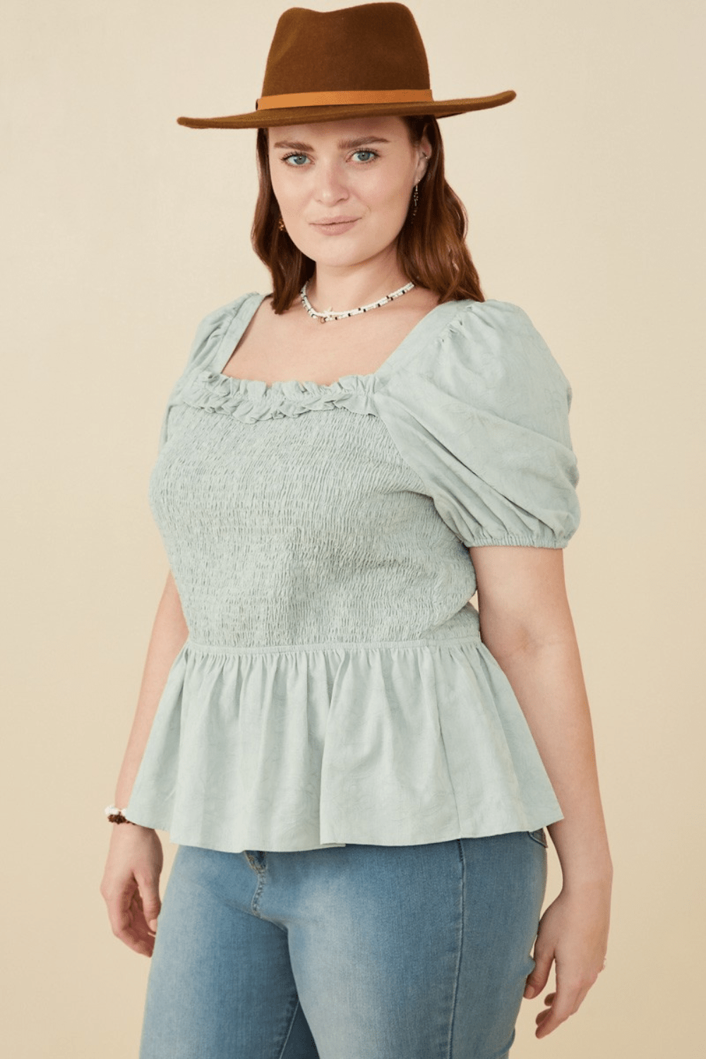 Irene Smocked Peplum Top with Ruffle Detail in Mint