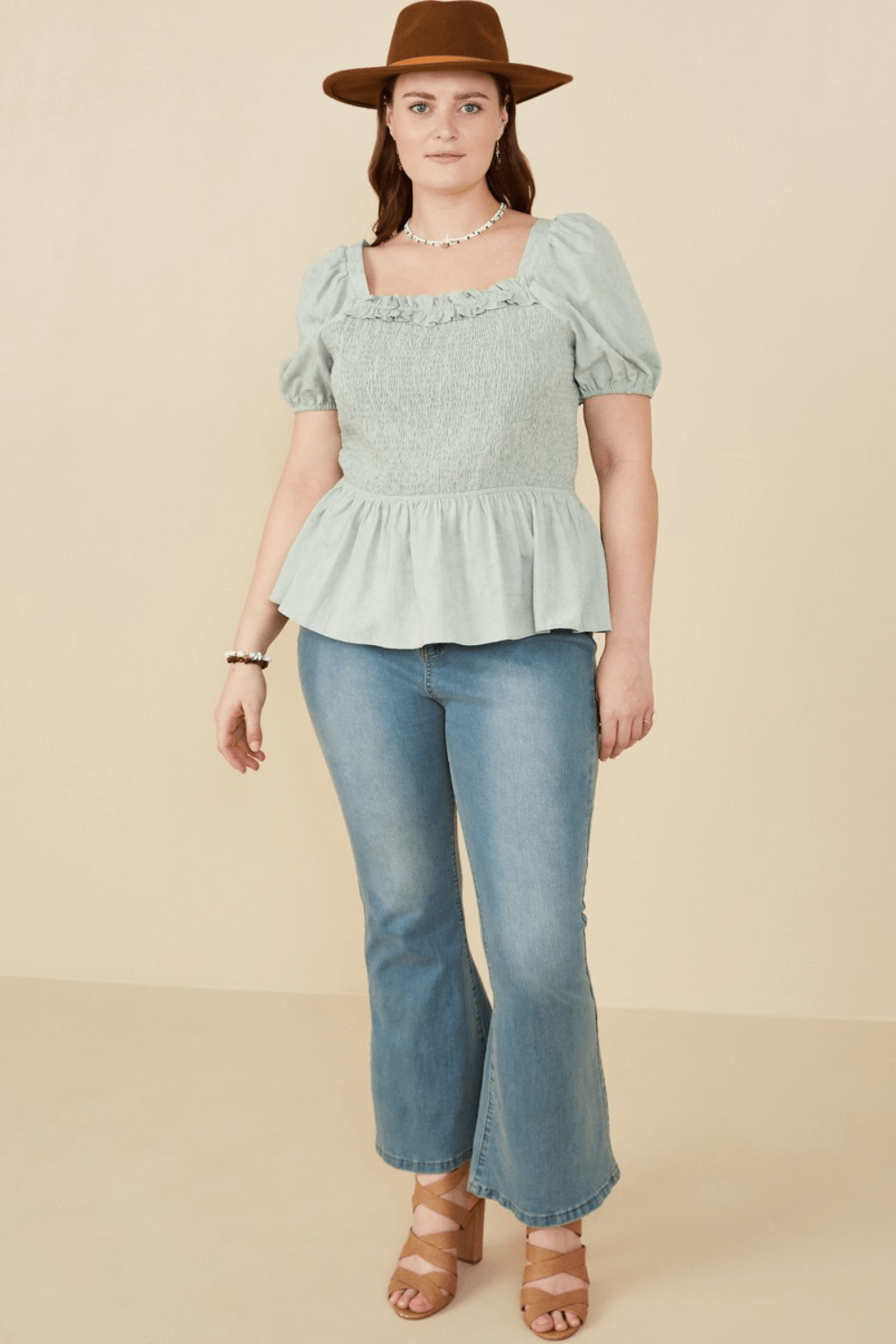 Irene Smocked Peplum Top with Ruffle Detail in Mint