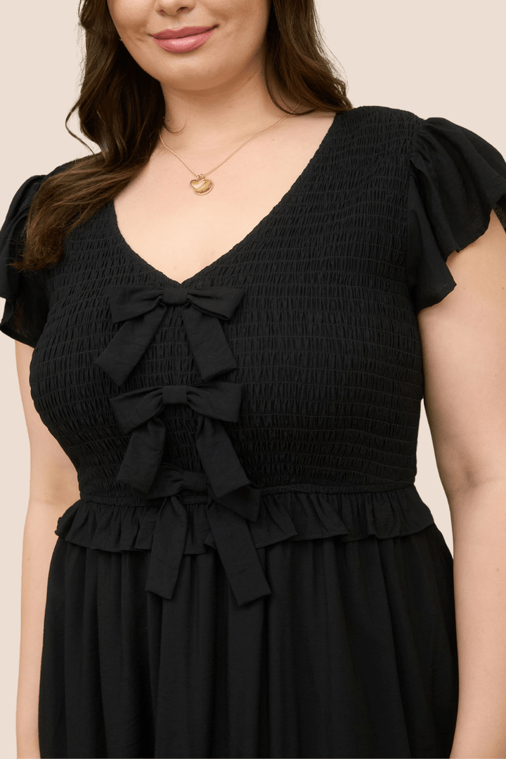Marie Bow Detail Smocked Ruffled Midi Dress in Black